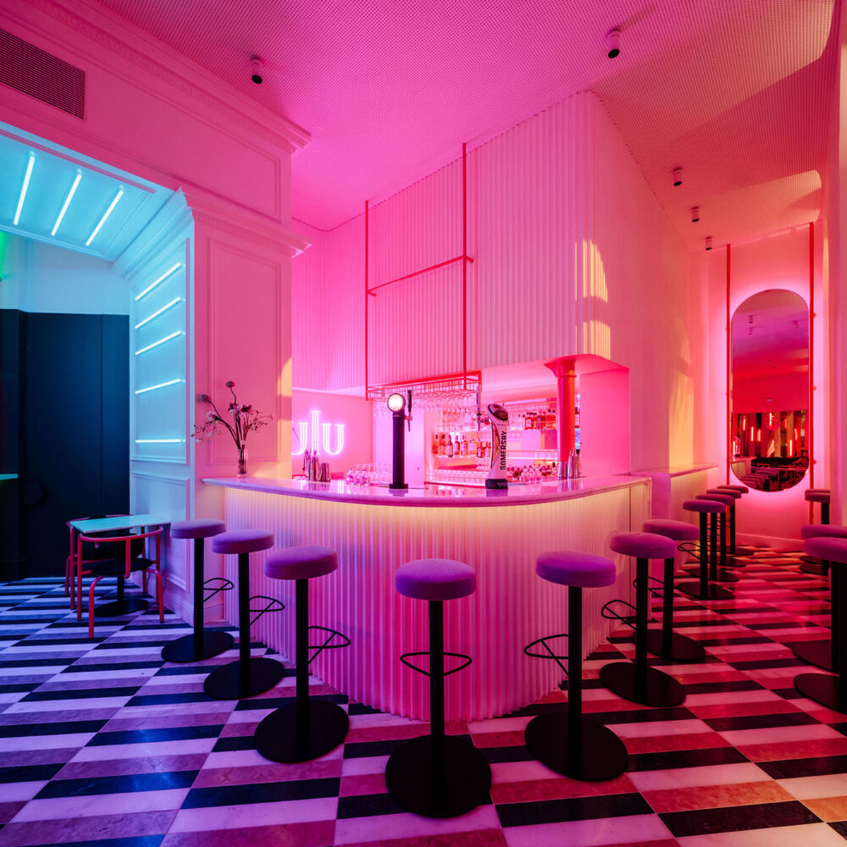 Colored neon lights bring 1920s Art Deco feeling to LULU Bar and Restaurant designed by DC.AD