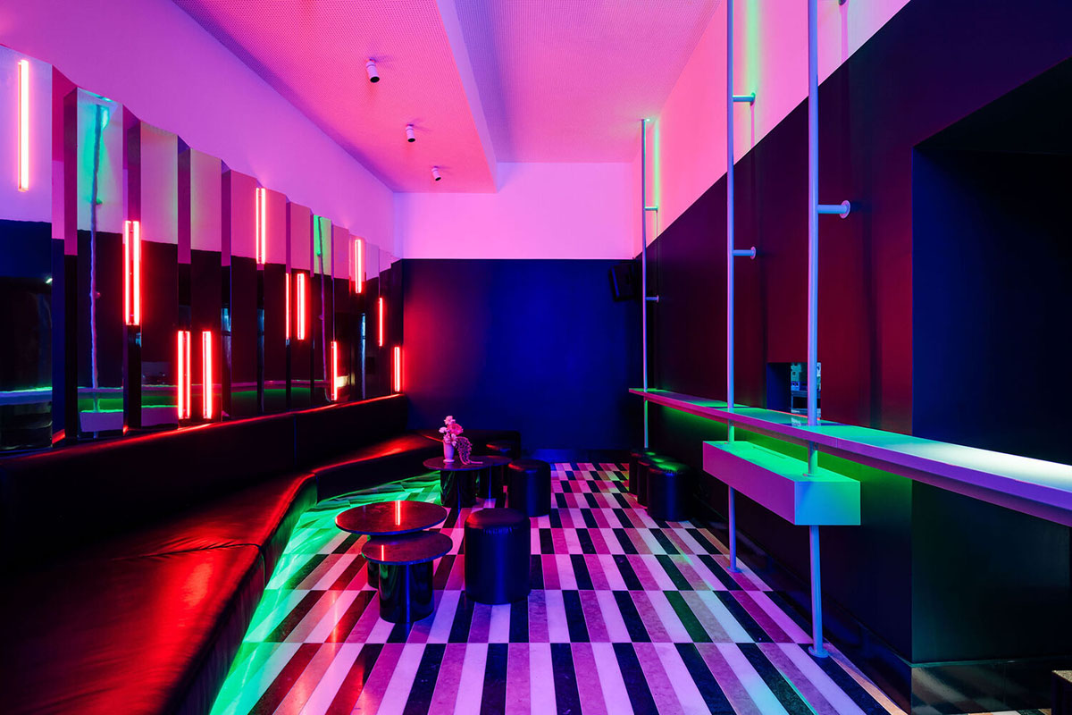 Colored neon lights bring 1920s Art Deco feeling to LULU Bar and Restaurant designed by DC.AD