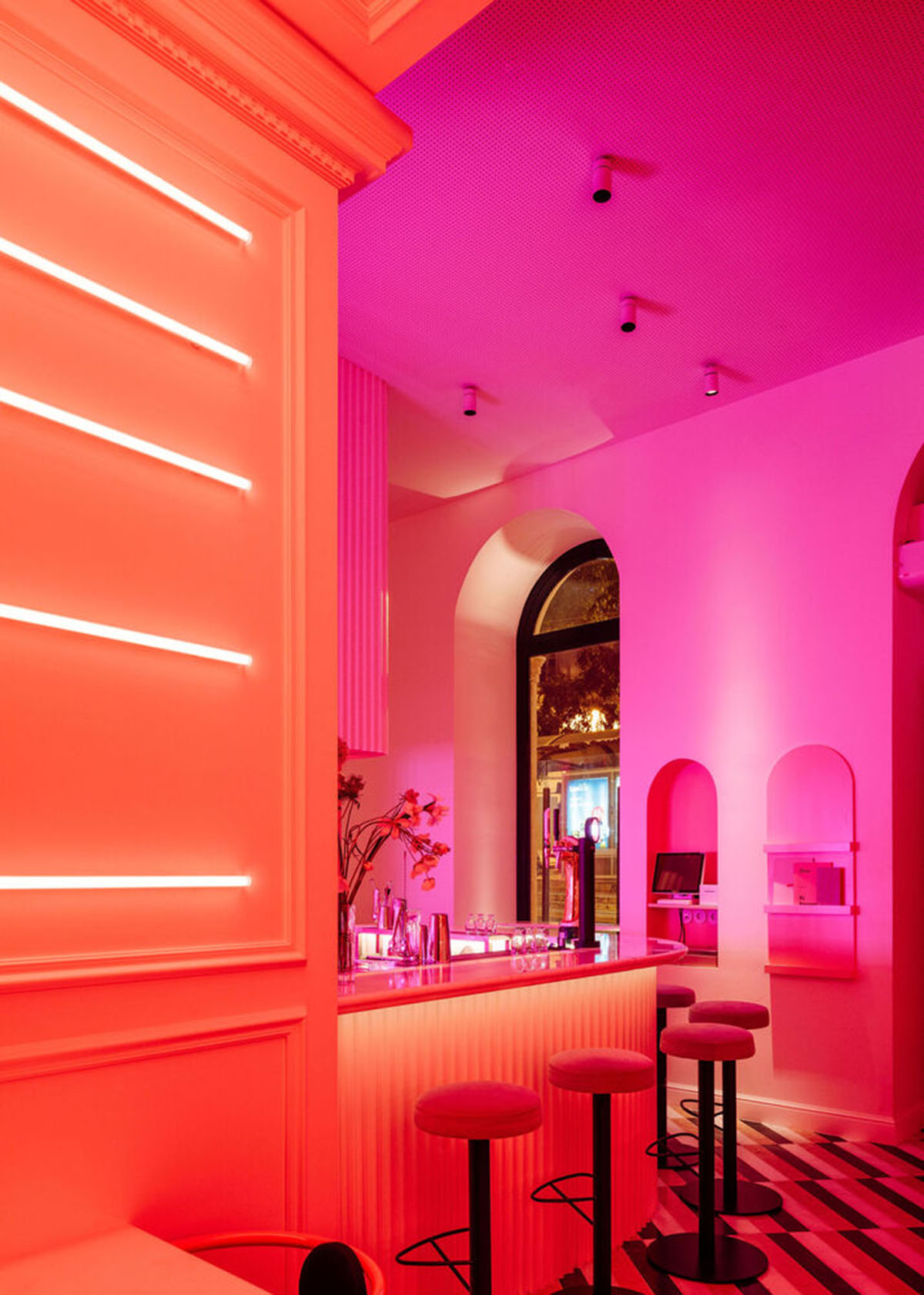 Colored neon lights bring 1920s Art Deco feeling to LULU Bar and Restaurant designed by DC.AD