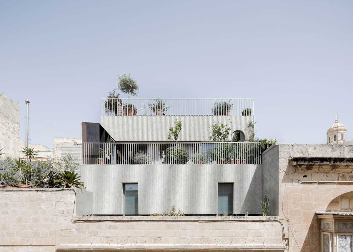 Chris Briffa converts old building into his home office by combining soft and hard materials in Malta