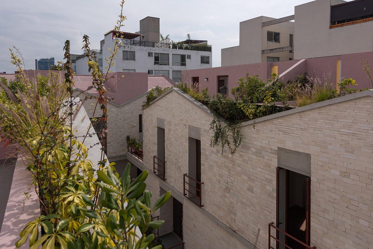 CPDA Arquitectos completes housing with dusty pink residential volumes in Mexico city
