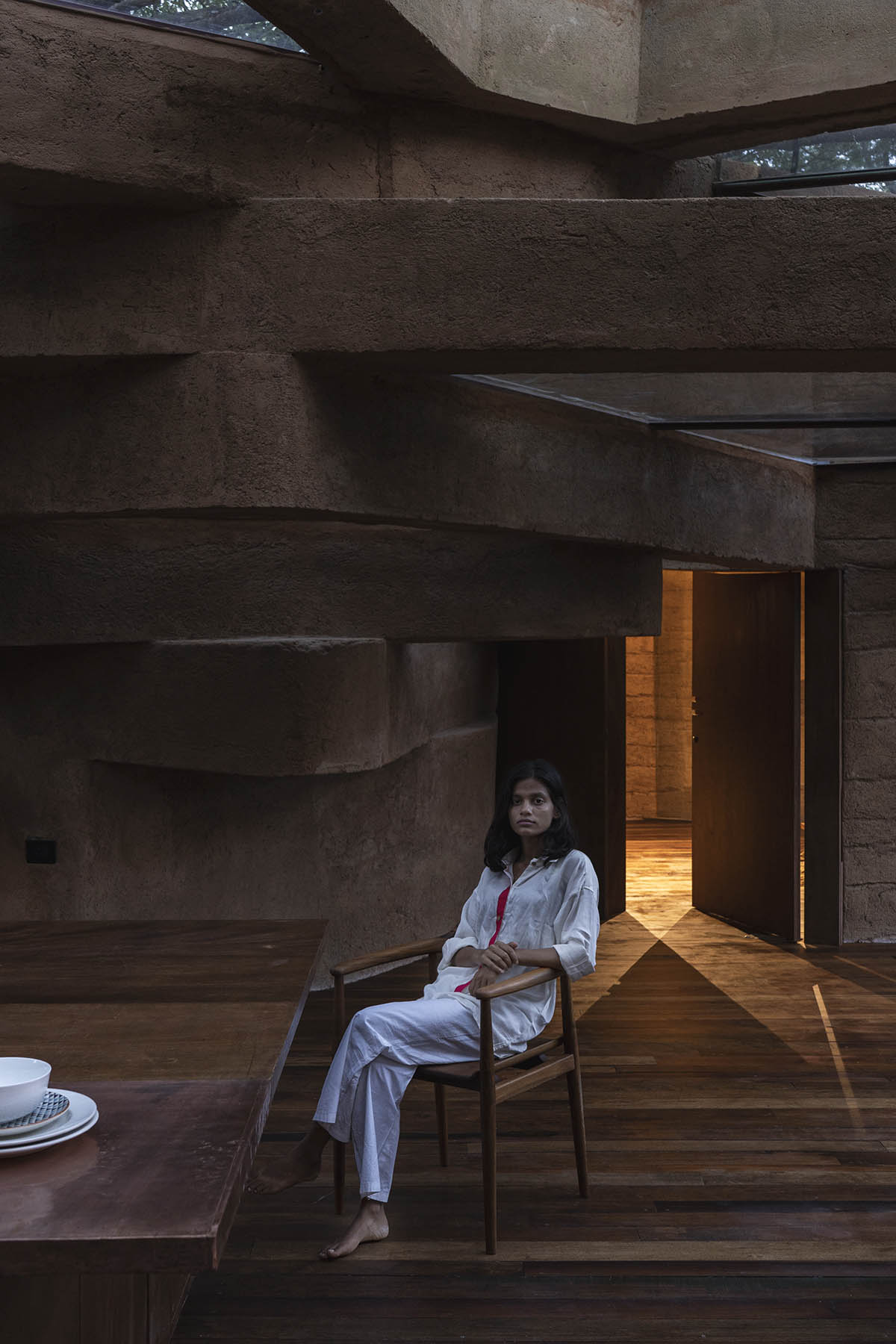 Wallmakers reveals snake house that forms a whirlpool on a steep hillside in India