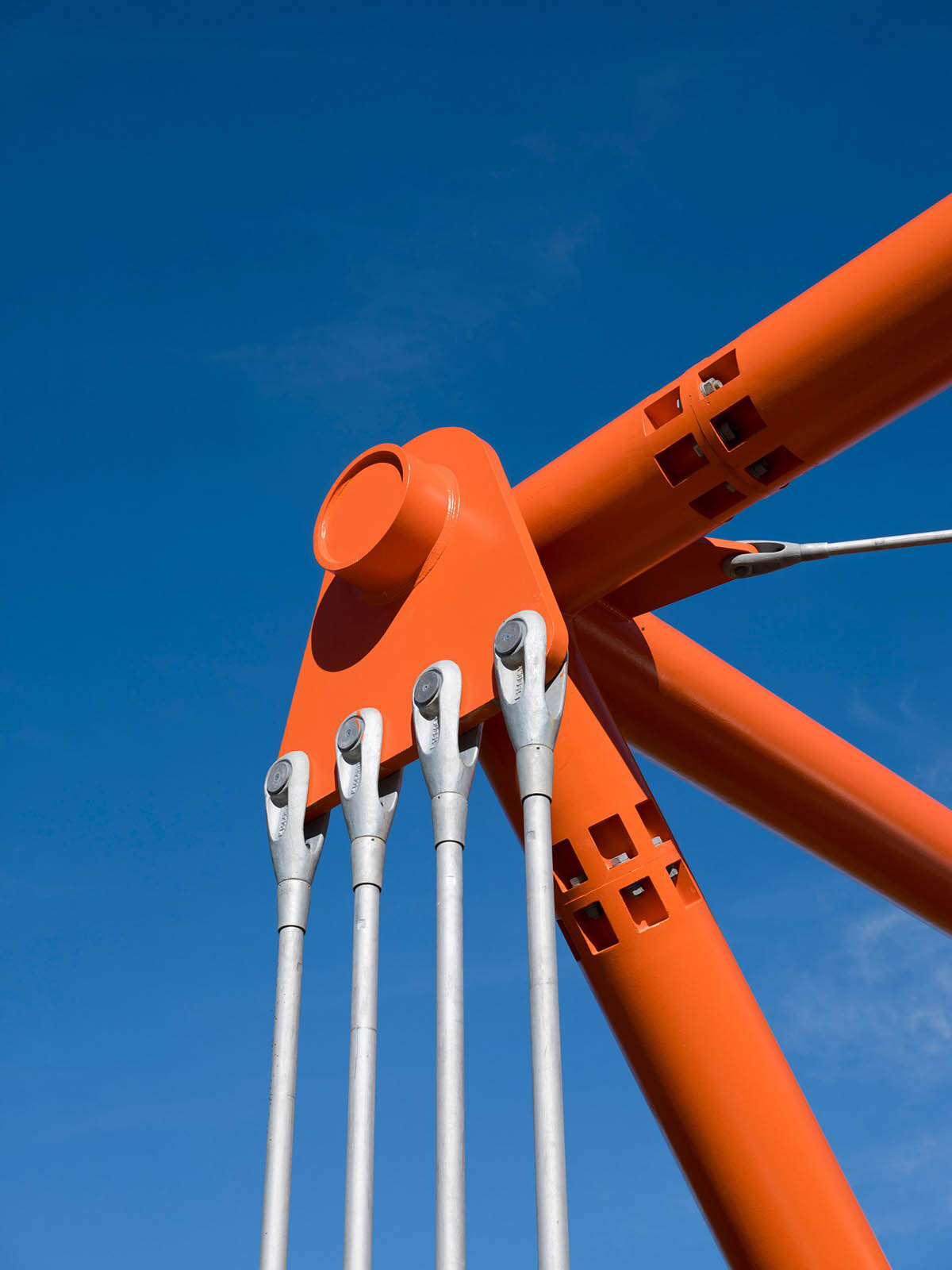 Richard Rogers' new gallery supported by orange steel beams cantilevers out 27 meters over hillside