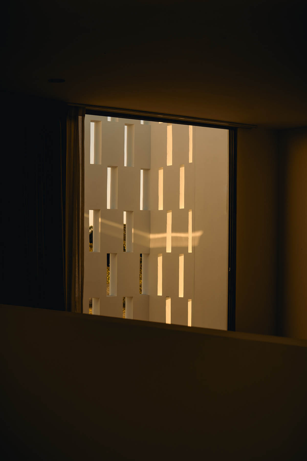 Rea Studio completes Casa Alazán with porous volume in Jalisco, Mexico