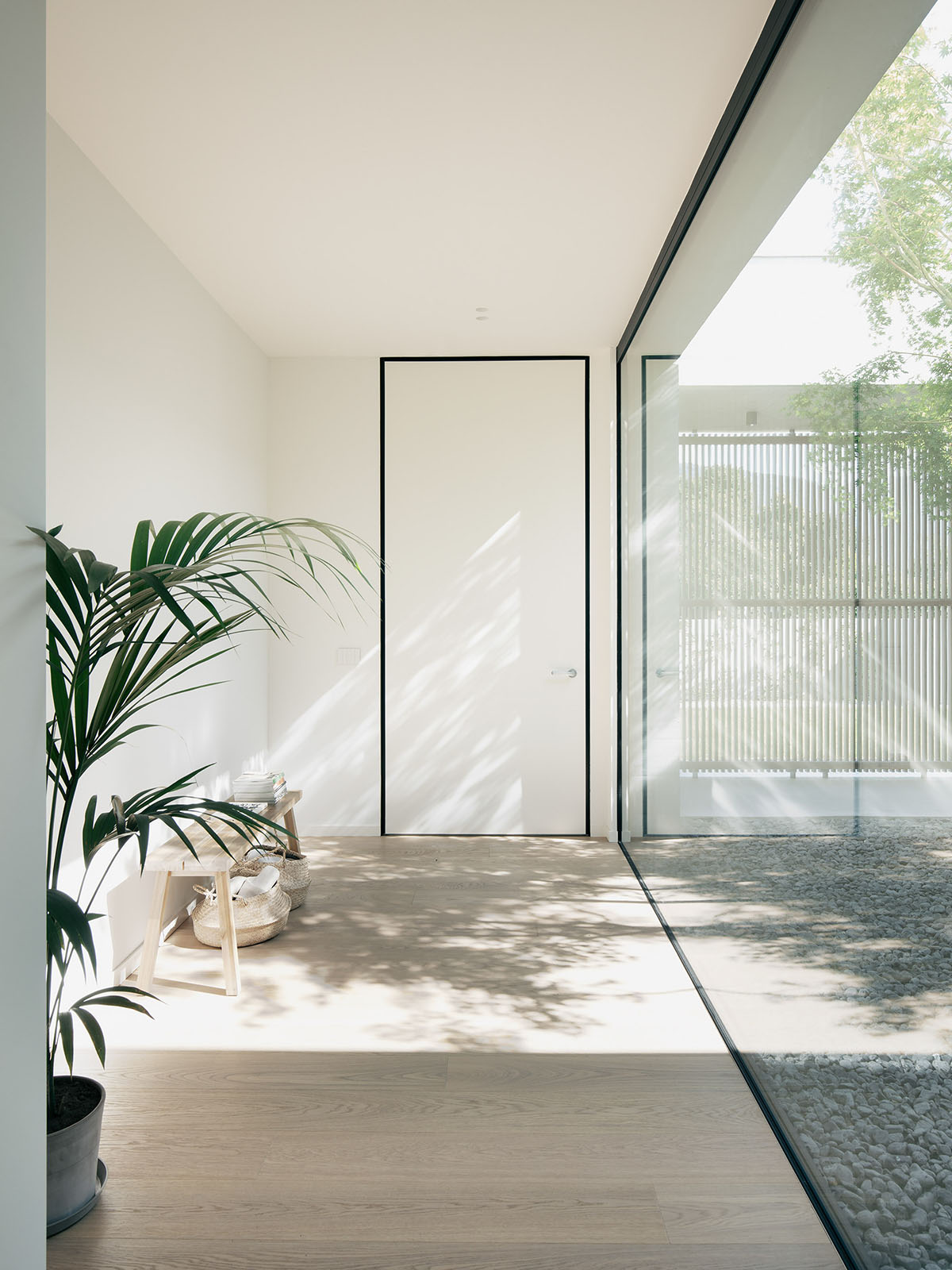 Concete home by Didonè Comacchio Architects is softened with wooden slats in Italy 