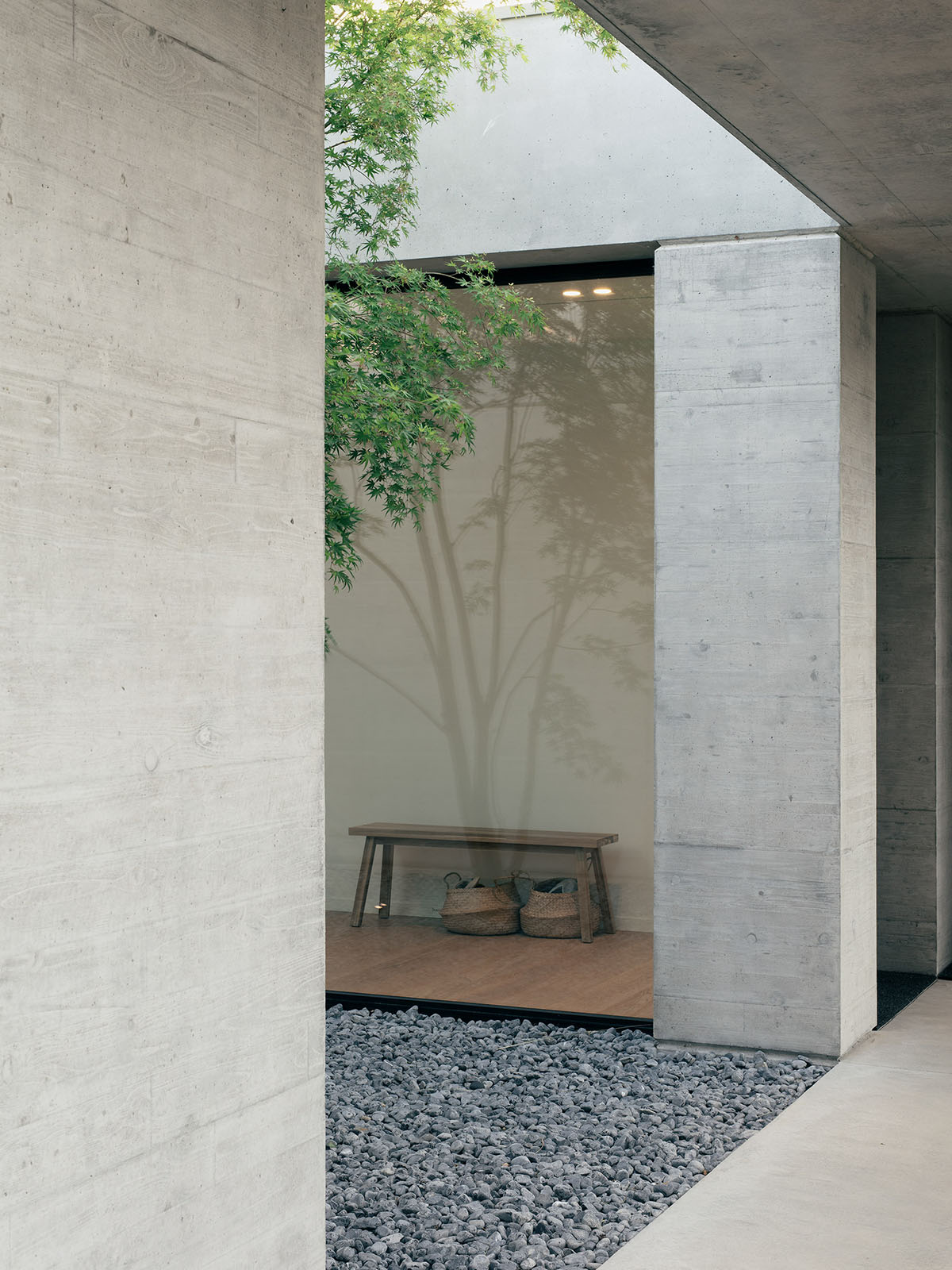 Concete home by Didonè Comacchio Architects is softened with wooden slats in Italy 