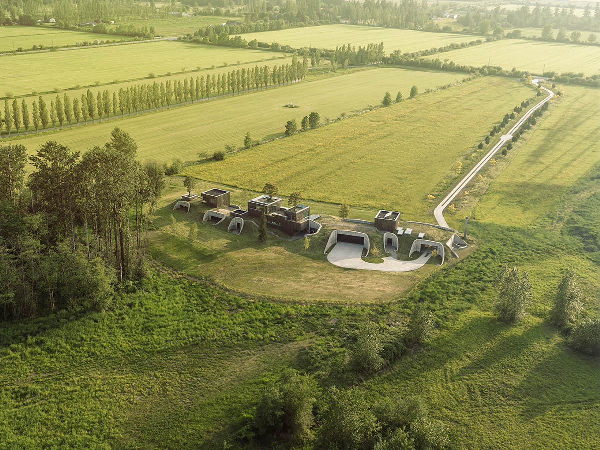 Omer Arbel shapes family home around monumental lily pad columns on a hayfield in Canada