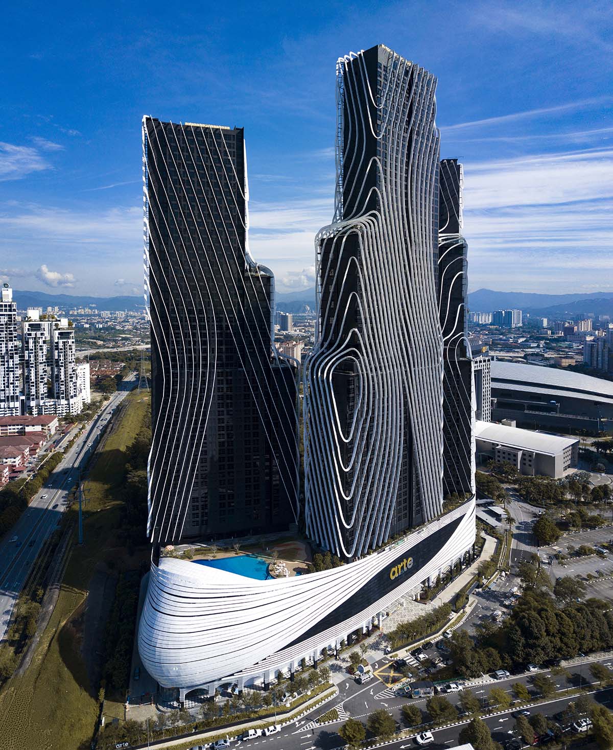 SPARK completes Art&eacute; MK towers in sculptured form wrapped by aluminum ribs in Kuala Lumpur