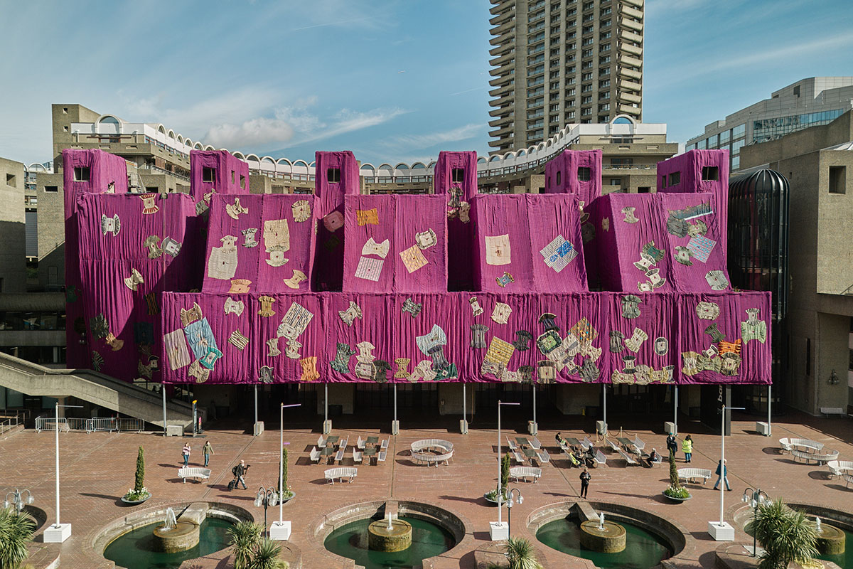 Ghanaian artist Ibrahim Mahama wraps Barbican Centre with handmade pink ...