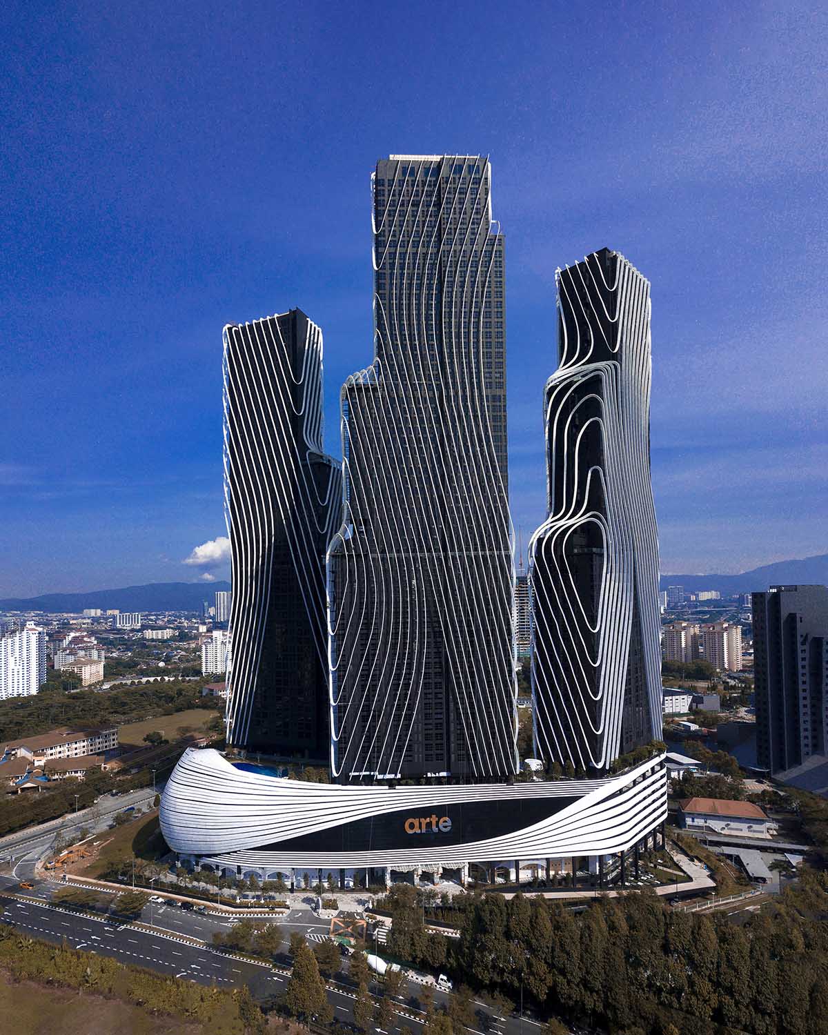 SPARK completes Art&eacute; MK towers in sculptured form wrapped by aluminum ribs in Kuala Lumpur