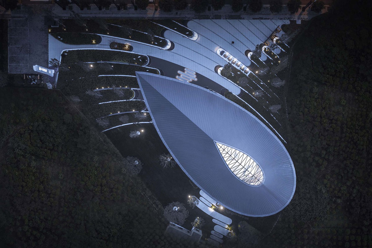Ruf Architects' exhibition gallery features water drop-shaped roof overlooking the Yongding River