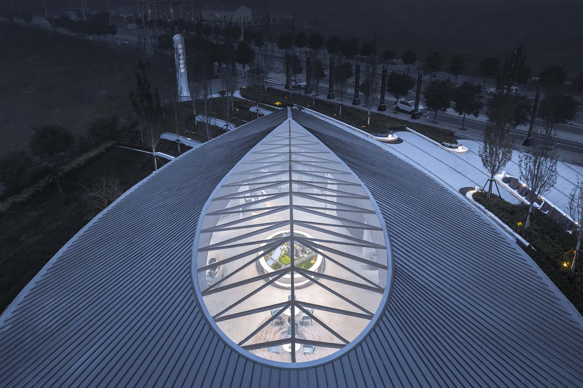 Ruf Architects' exhibition gallery features water drop-shaped roof overlooking the Yongding River