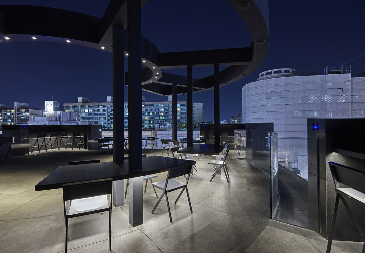 Ateliers Jean Nouvel wraps Dolce & Gabbana's Seoul store with four pillars made of black granite