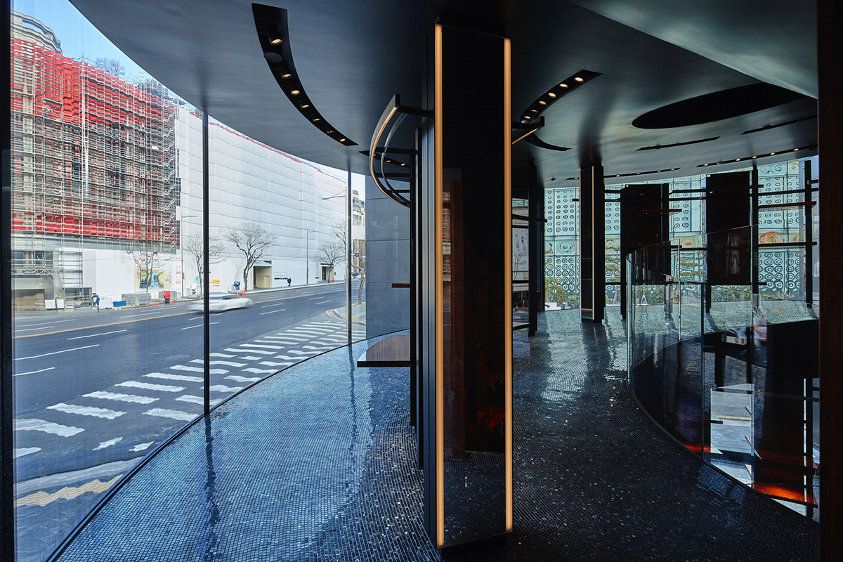 Ateliers Jean Nouvel wraps Dolce & Gabbana's Seoul store with four pillars made of black granite