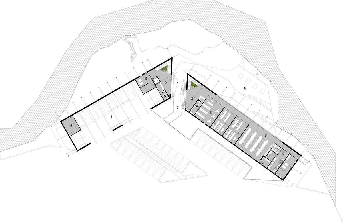 DF Arquitectos completes Pumas Clubhouse from volcanic stone in Mexico