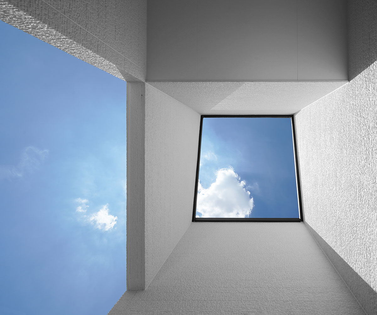 Jun Murata built small guesthouse with cut-out skylight in Japan
