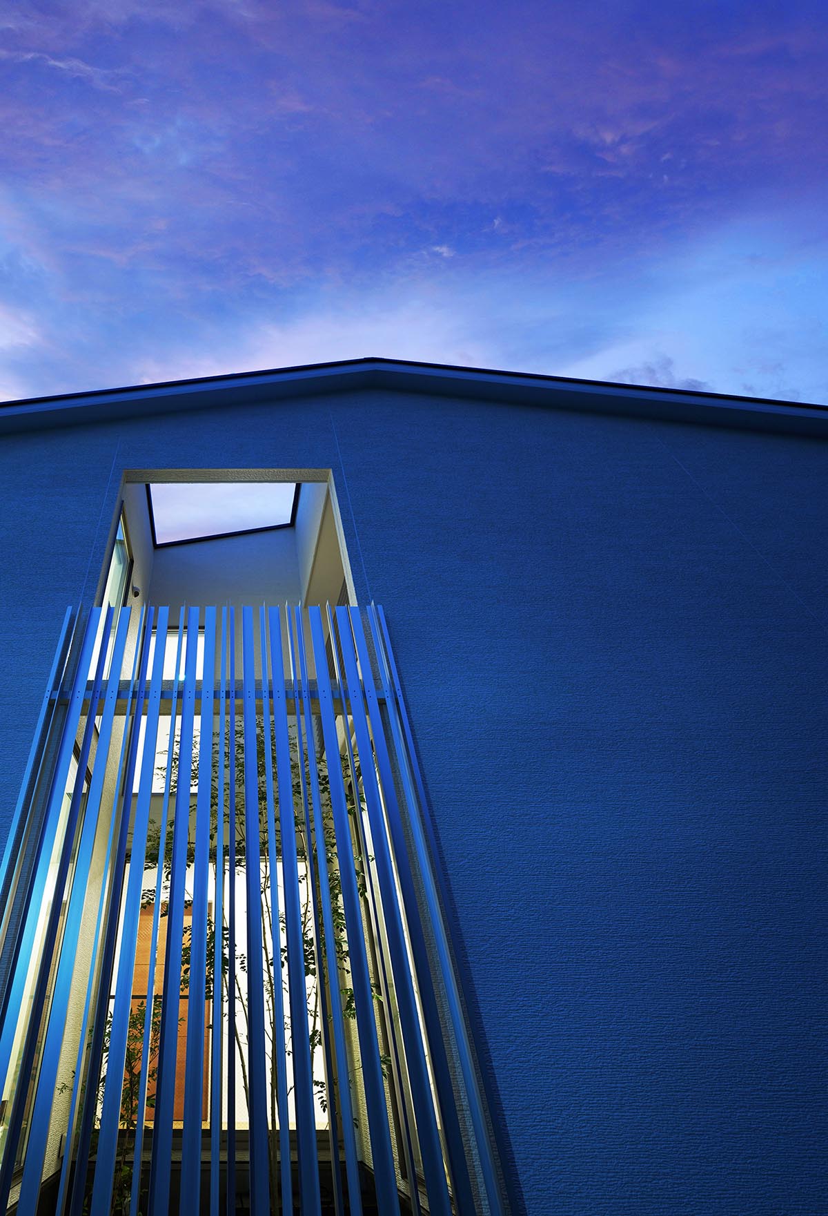 Jun Murata built small guesthouse with cut-out skylight in Japan