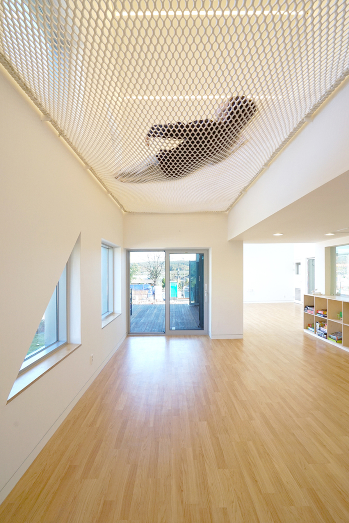 JYA-RCHITECTS designs childcare center with pitched roofs and colorful units in South Korea