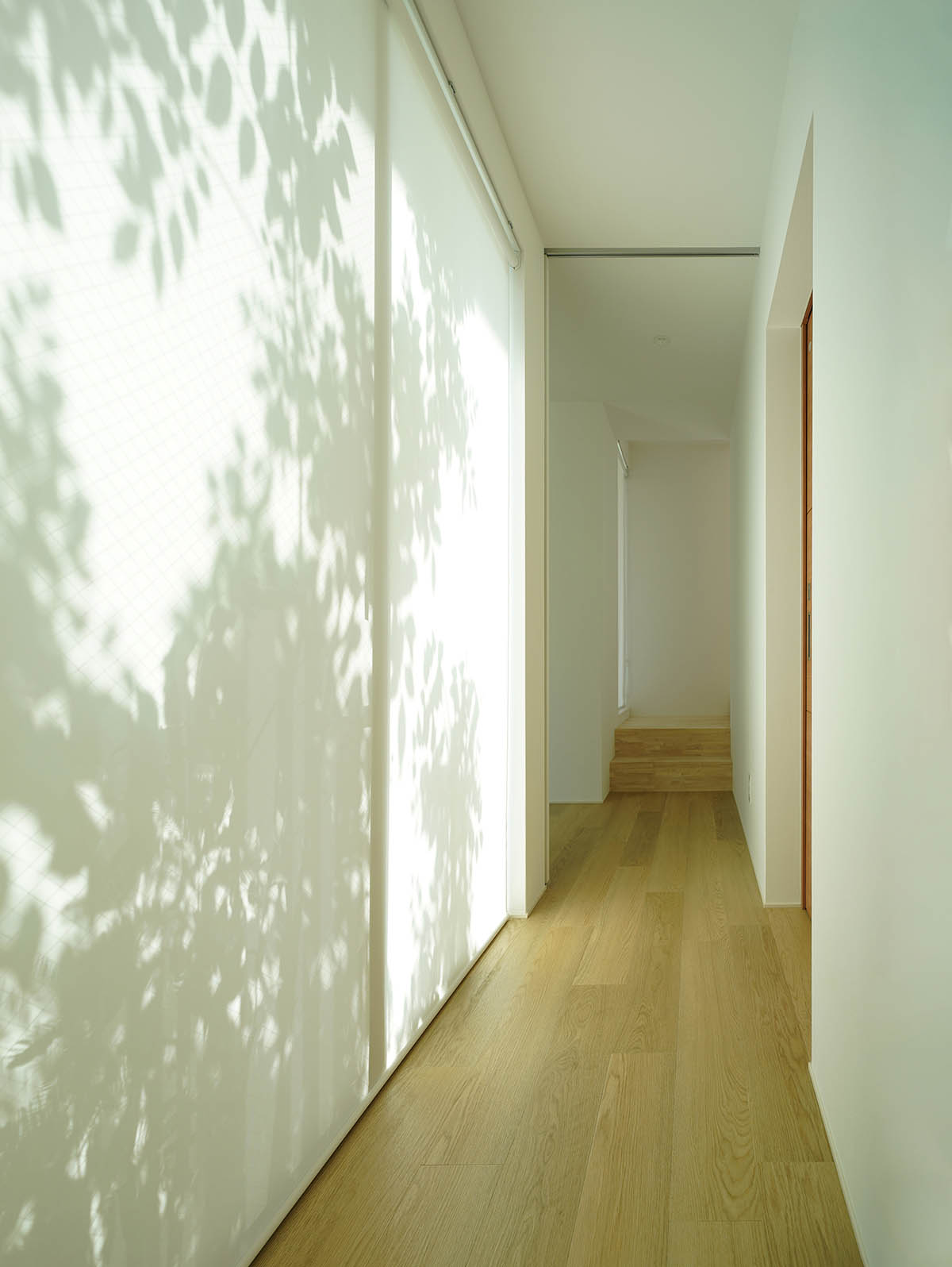 Jun Murata built small guesthouse with cut-out skylight in Japan