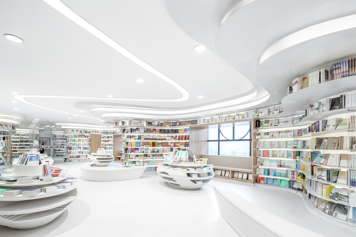 The First Zhongshu Bookstore in Xi'an, China by Wutopia Lab Performs a White Divine Comedy
