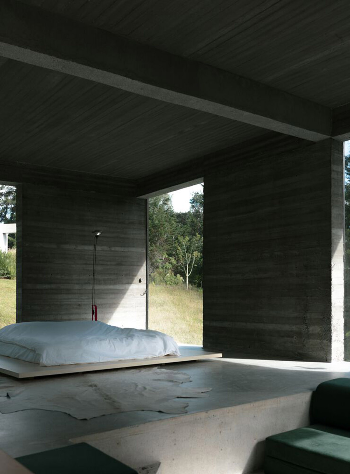 Ballen House in Colombia explores possibilities of living in larger spaces in a lush hilly terrain