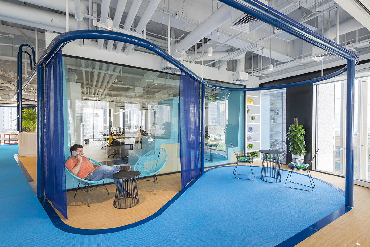 100architects completes underwater-themed-office for Club Med headquarters in Shanghai