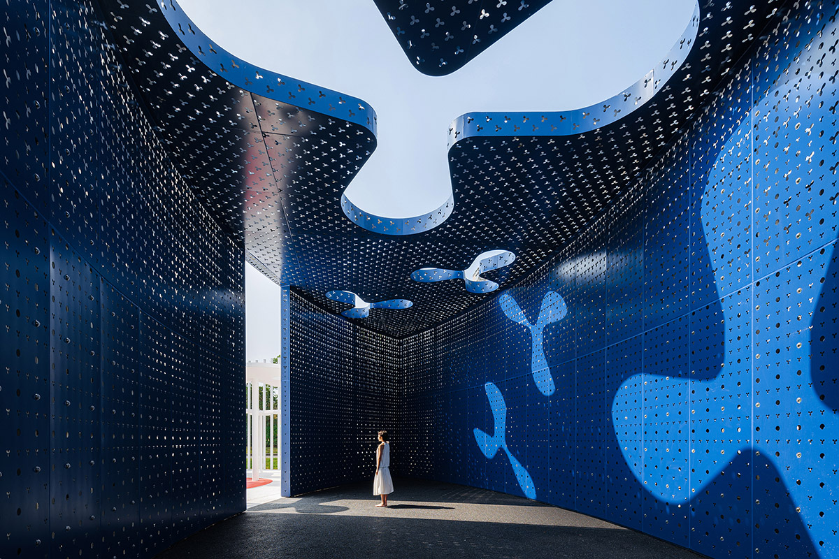 Wutopia Lab creates surreal forest made of 108 white steel columns for sales center in Huzhou