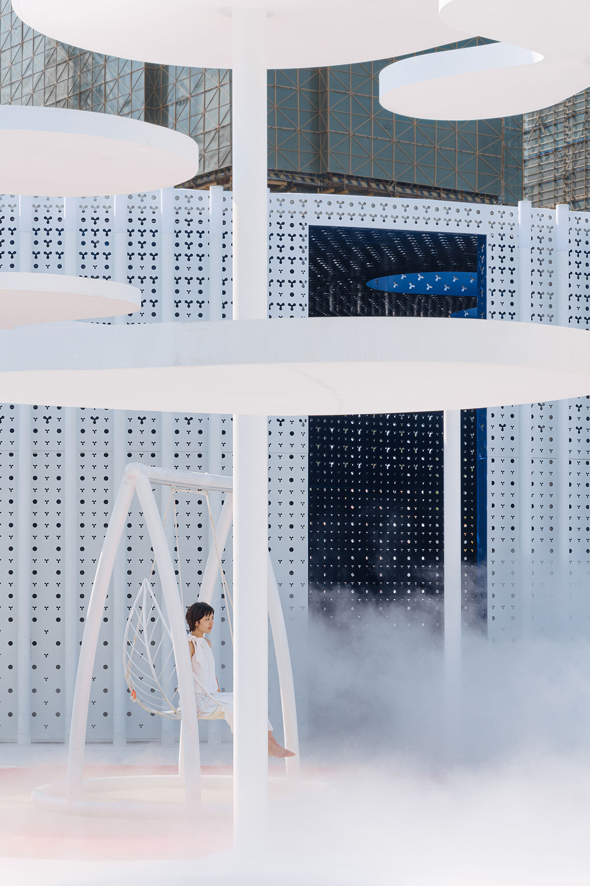 Wutopia Lab creates surreal forest made of 108 white steel columns for sales center in Huzhou