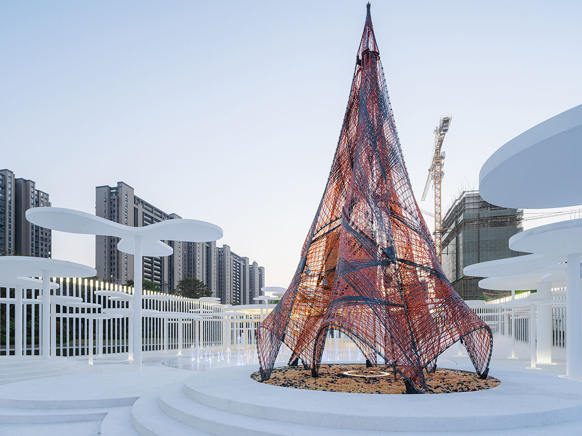 Wutopia Lab creates surreal forest made of 108 white steel columns for sales center in Huzhou