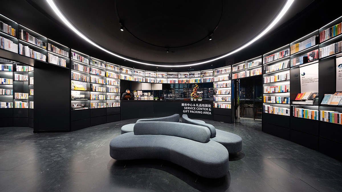 Wutopia Lab creates continuous space for stack of books inside of Shanghai's tallest building