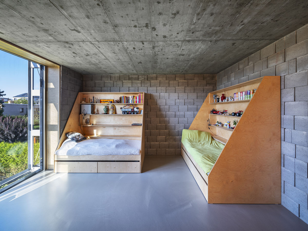 ŠÉPKA Architects wraps old residence with steel lattice featuring climbing plants as facade element