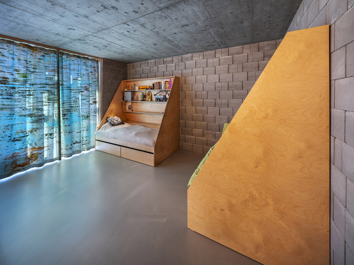 ŠÉPKA Architects wraps old residence with steel lattice featuring climbing plants as facade element