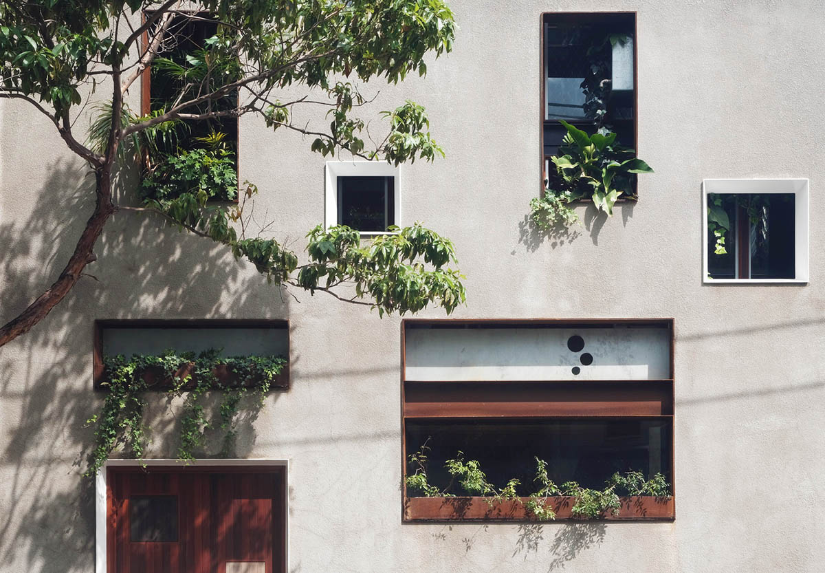 CplusC Architectural Workshop rejuvenates old shop house with blow up green infills in Australia