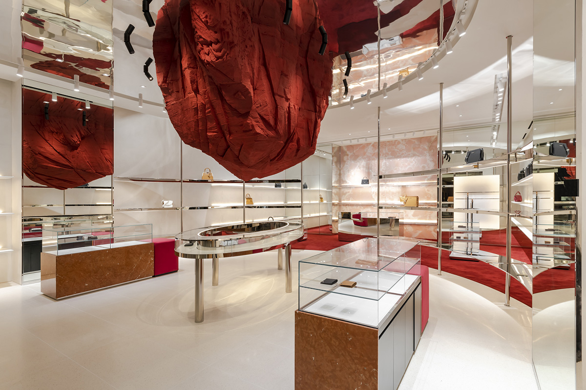 Giant sienna-colored meteor rock is suspended from the ceiling of flagship store in Kuala Lumpur