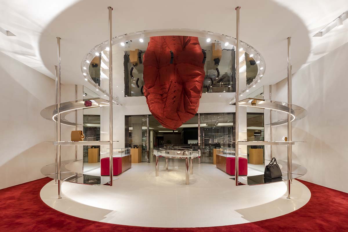 Giant sienna-colored meteor rock is suspended from the ceiling of flagship store in Kuala Lumpur