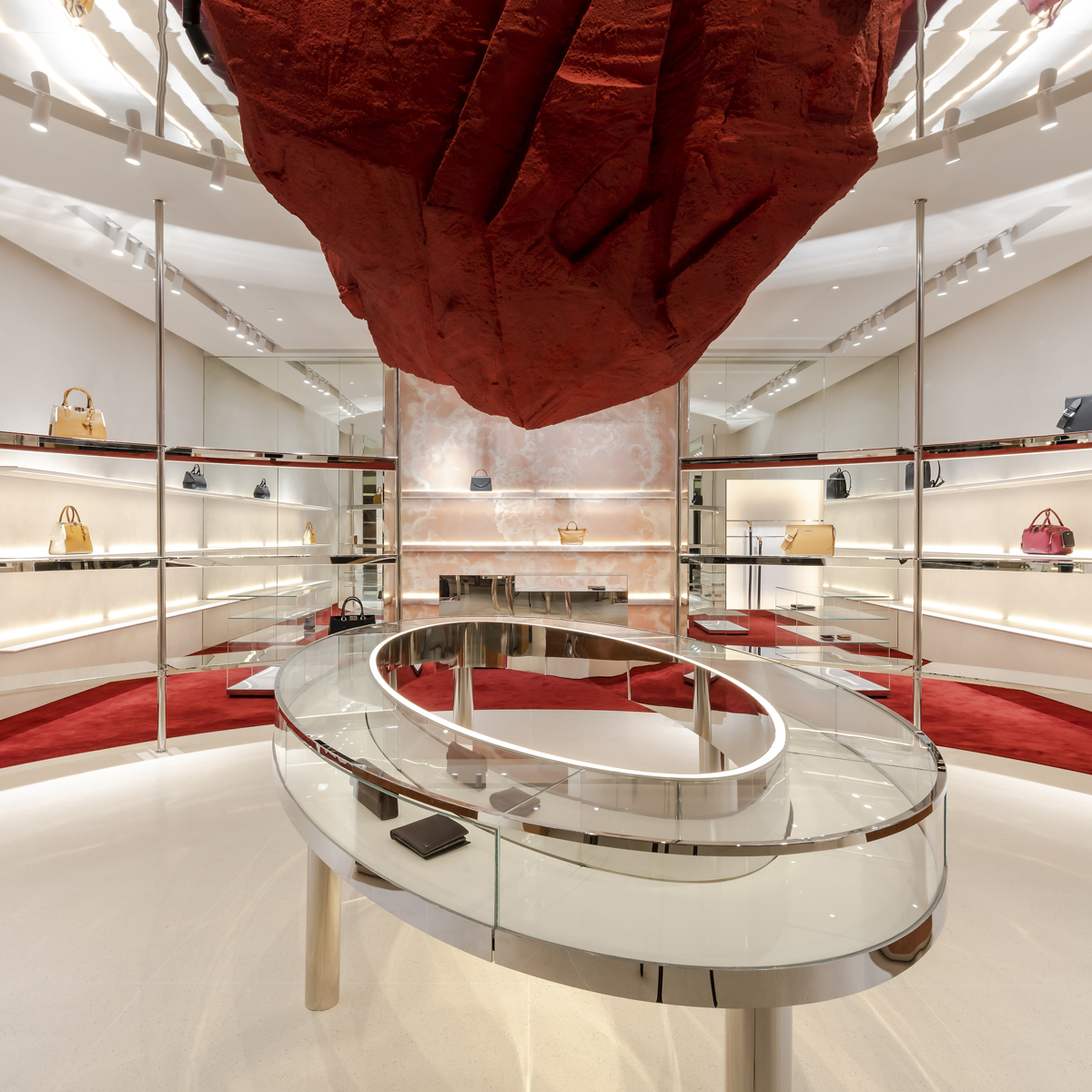 Giant sienna-colored meteor rock is suspended from the ceiling of flagship store in Kuala Lumpur