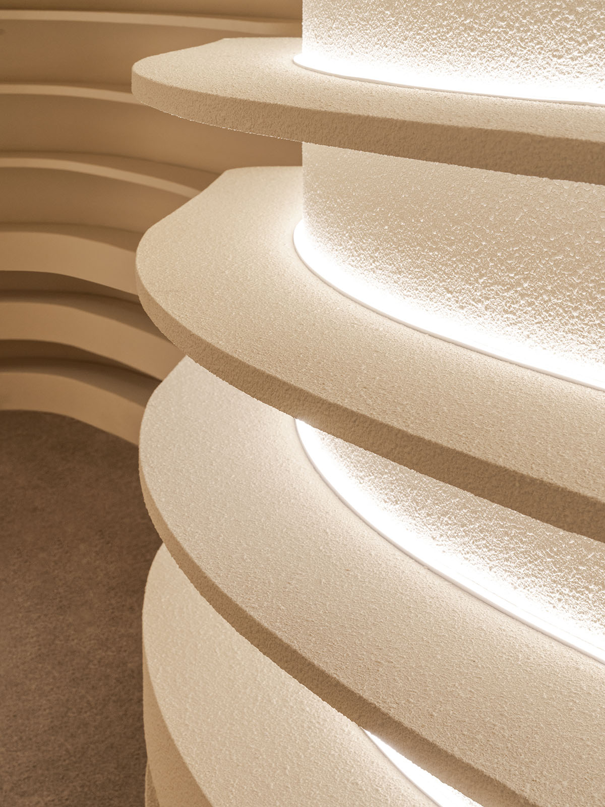 Spacemen creates cavernous interior with rounded lines for a store in Kuala Lumpur