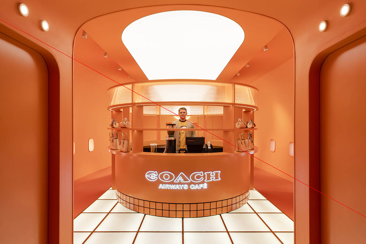 Interior of abandoned plane is converted into a retail store clad in full orange colour in Malaysia