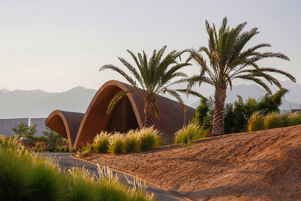 Oppenheim Architecture completes Ayla Golf Academy with wavy roofs in deserted landscape of Jordan