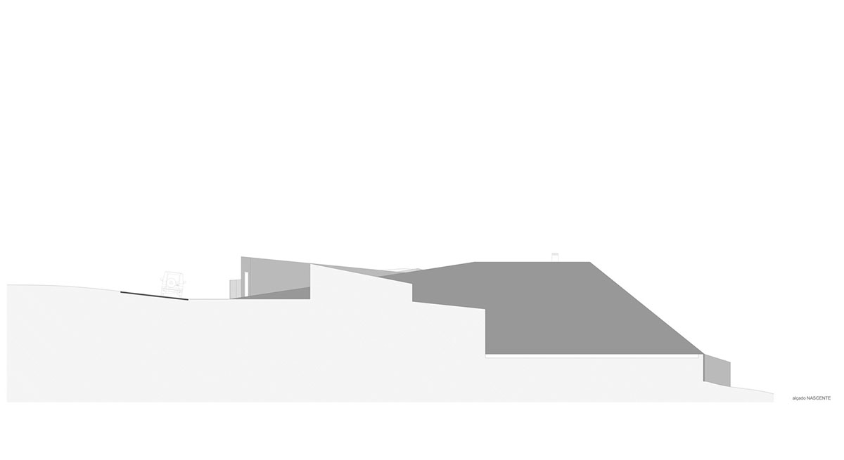 Contaminar Arquitectos built cave-like house from irregular walls inspired by rocky topography