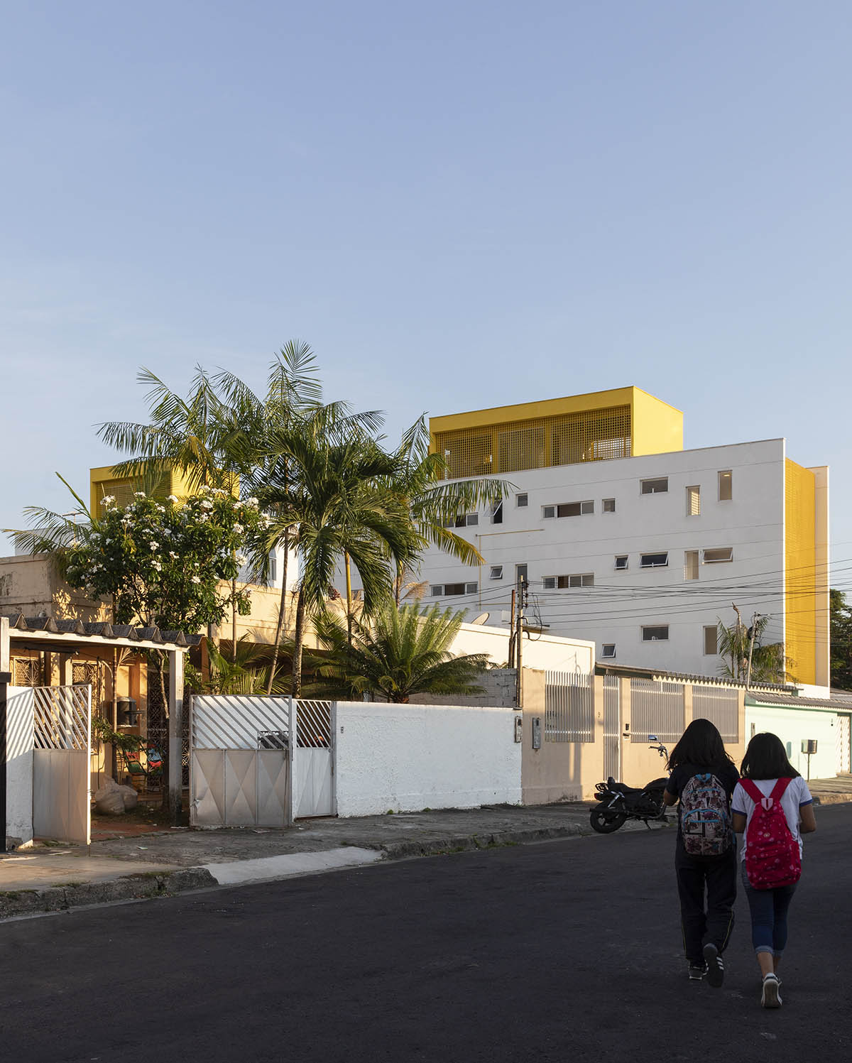 Manga - Vila Santa Thereza Building by Laurent Troost features yellow metal screen in Brazil