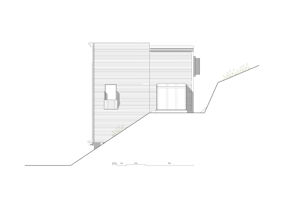 High windows allow users to get well-lit living spaces for this house by Rever & Drage Architects