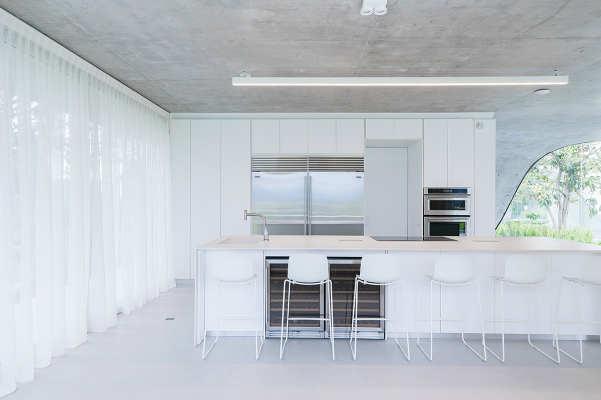 Estudio Felipe Escudero designs Magnolia House around a courtyard and magnolia tree in Ecuador