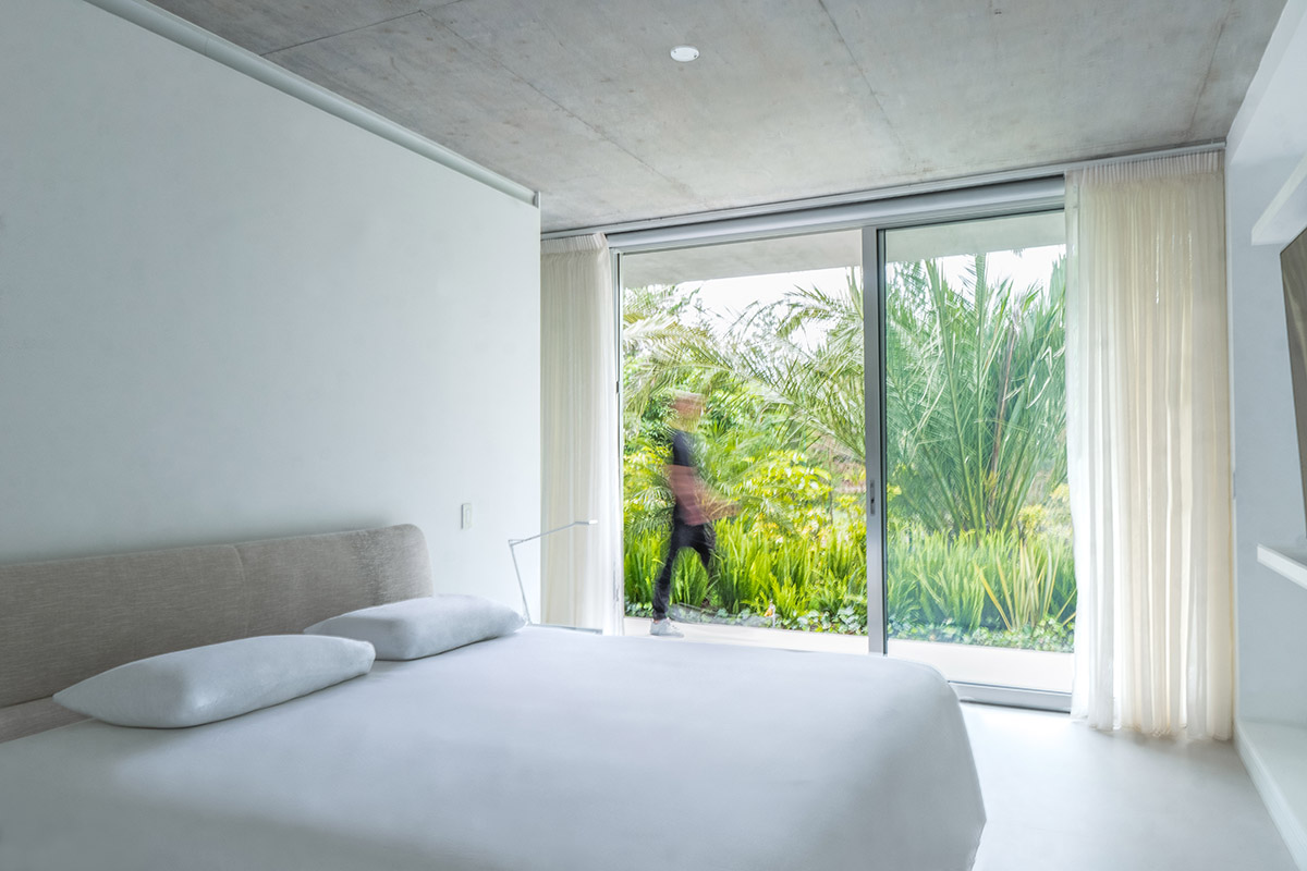 Estudio Felipe Escudero designs Magnolia House around a courtyard and magnolia tree in Ecuador