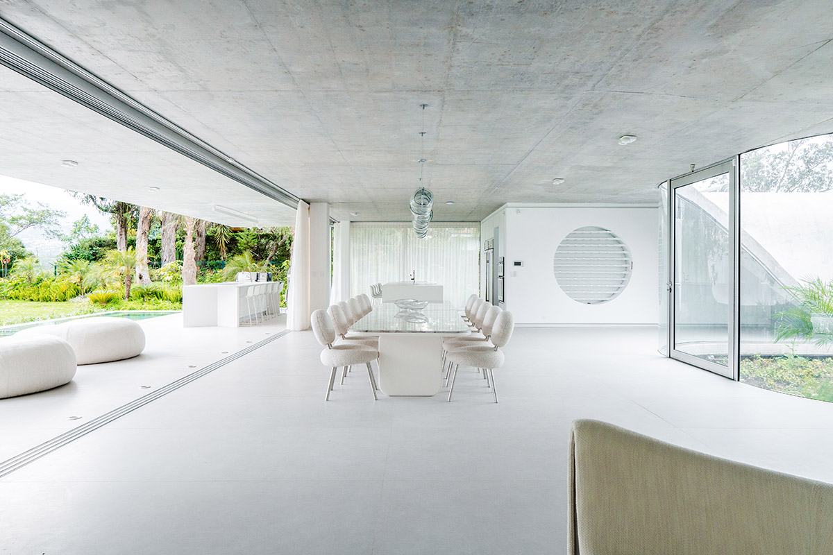 Estudio Felipe Escudero designs Magnolia House around a courtyard and magnolia tree in Ecuador