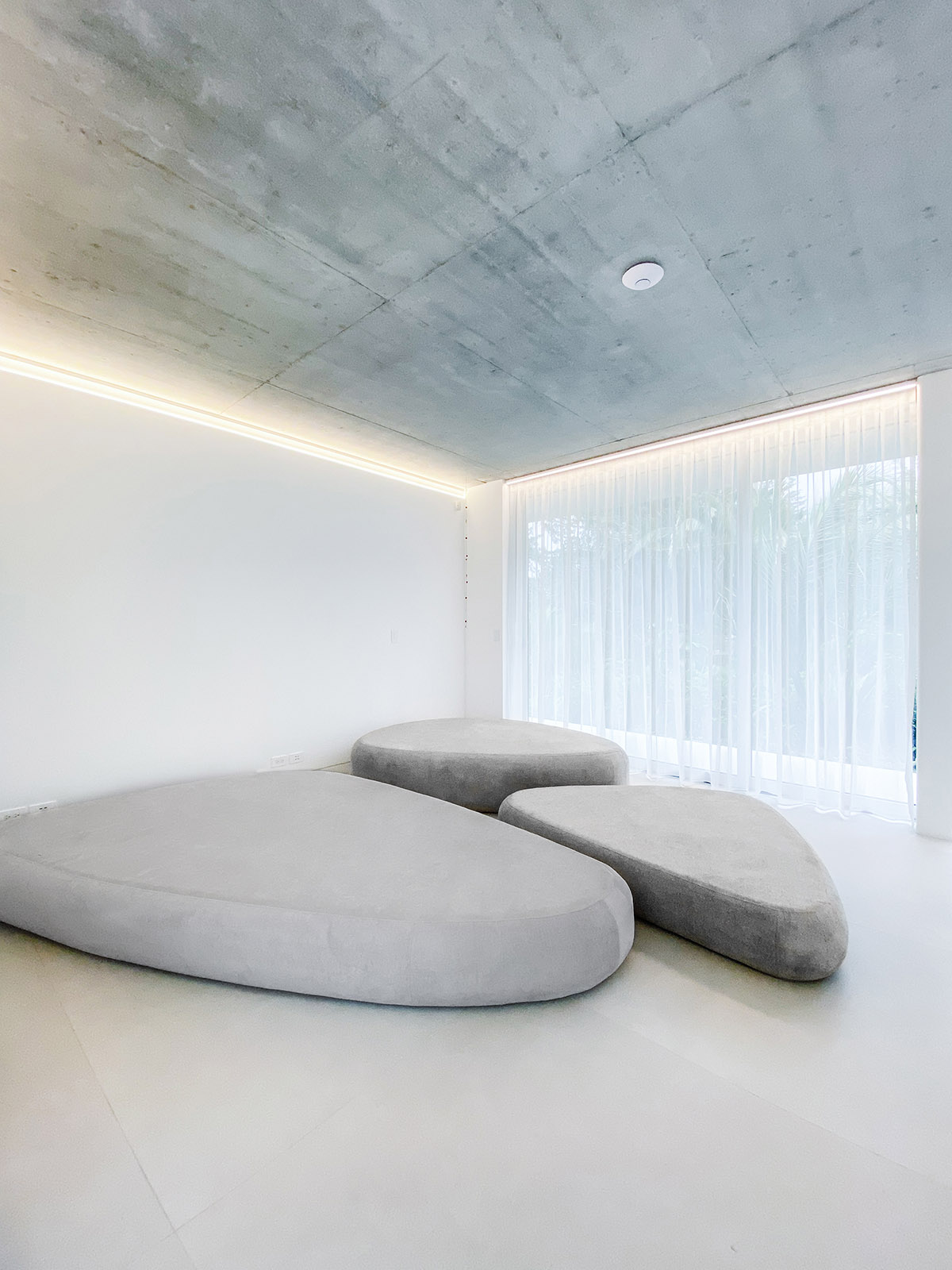 Estudio Felipe Escudero designs Magnolia House around a courtyard and magnolia tree in Ecuador