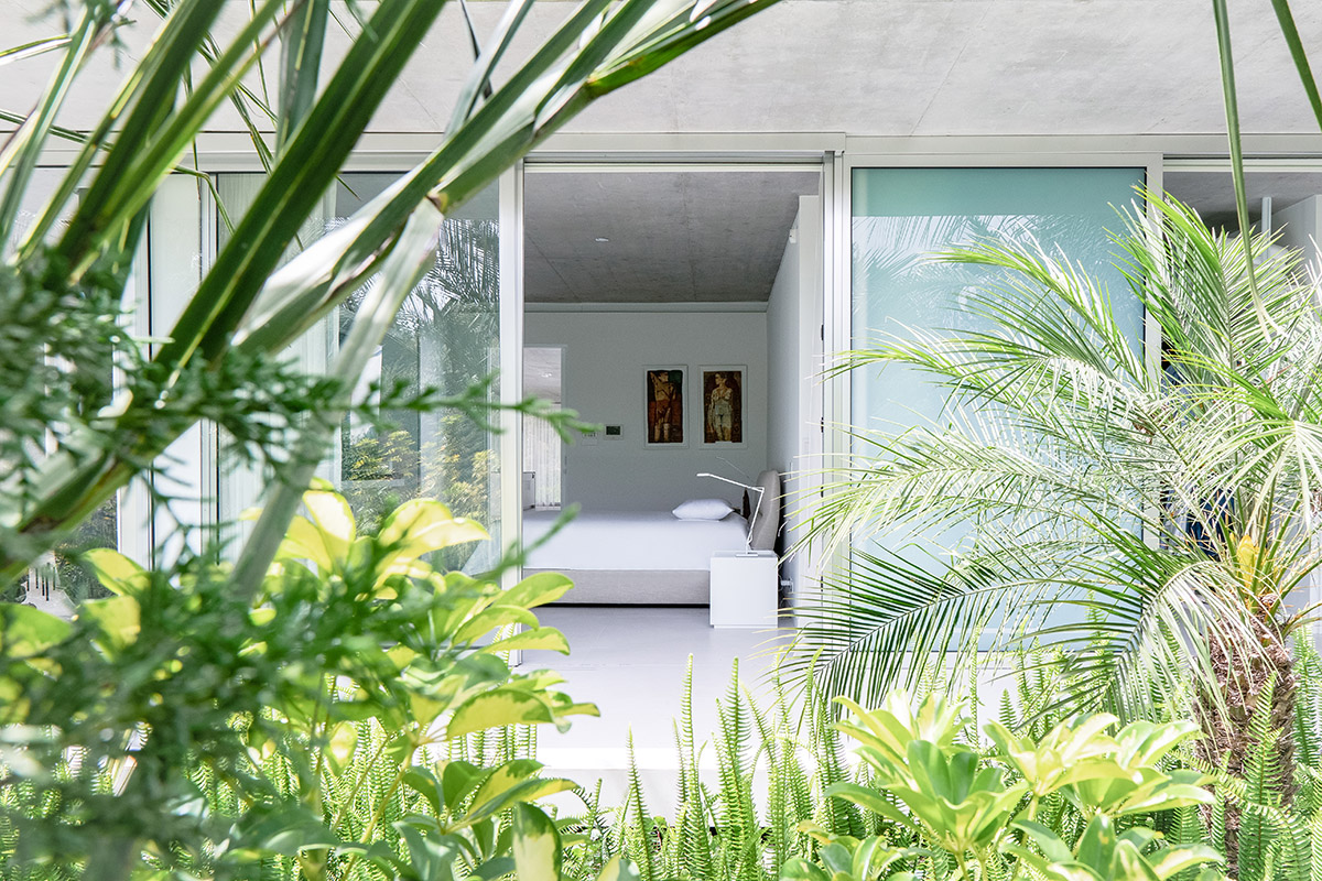 Estudio Felipe Escudero designs Magnolia House around a courtyard and magnolia tree in Ecuador