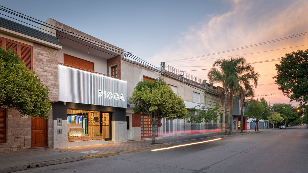 Efeeme arquitectos suspends thousands of broomsticks from the ceiling of patisserie in C&oacute;rdoba