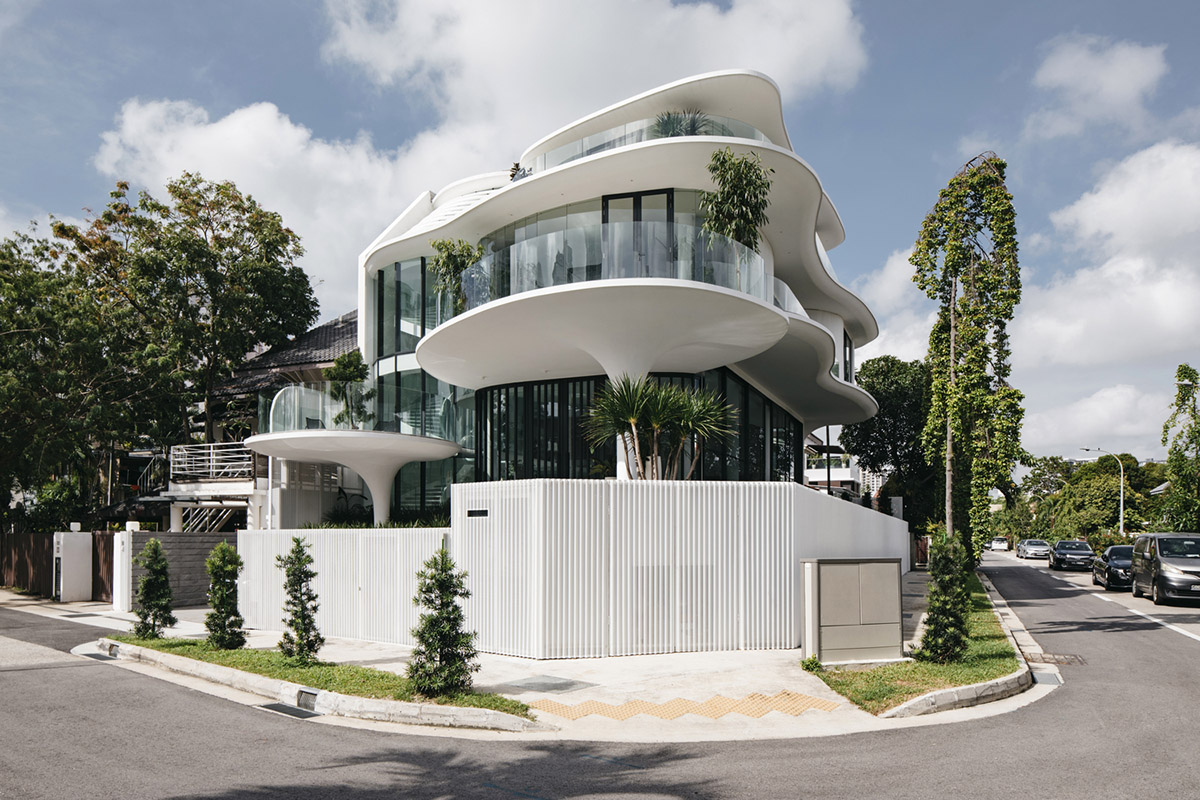 EHKA Studio's curvaceous residence features floating pods offering playful facade in Singapore