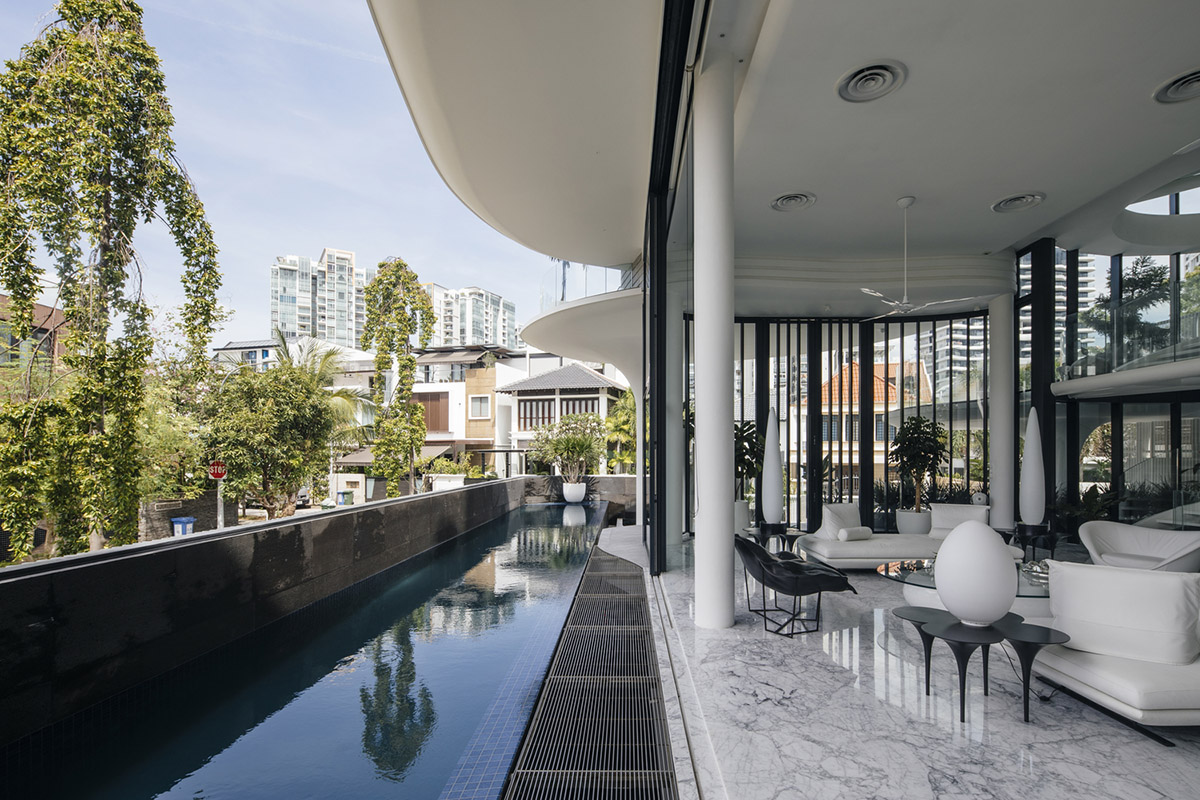EHKA Studio's curvaceous residence features floating pods offering playful facade in Singapore